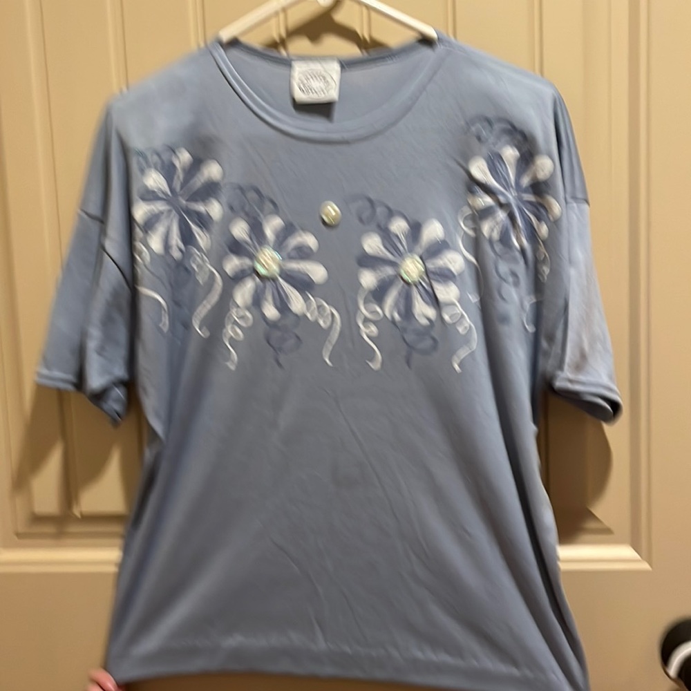 FUN blue T-shirt with designs and buttons!
